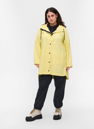 Manteau de pluie avec capuche et poches, Pale Banana, Model image number 2