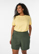 Short avec poches et coupe ample, Vert, Model image number 0