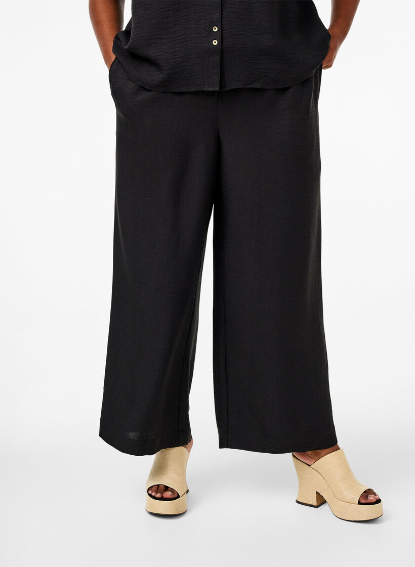 Pantalon ample avec ceinture élastique et poches, Noir, Model image number 2