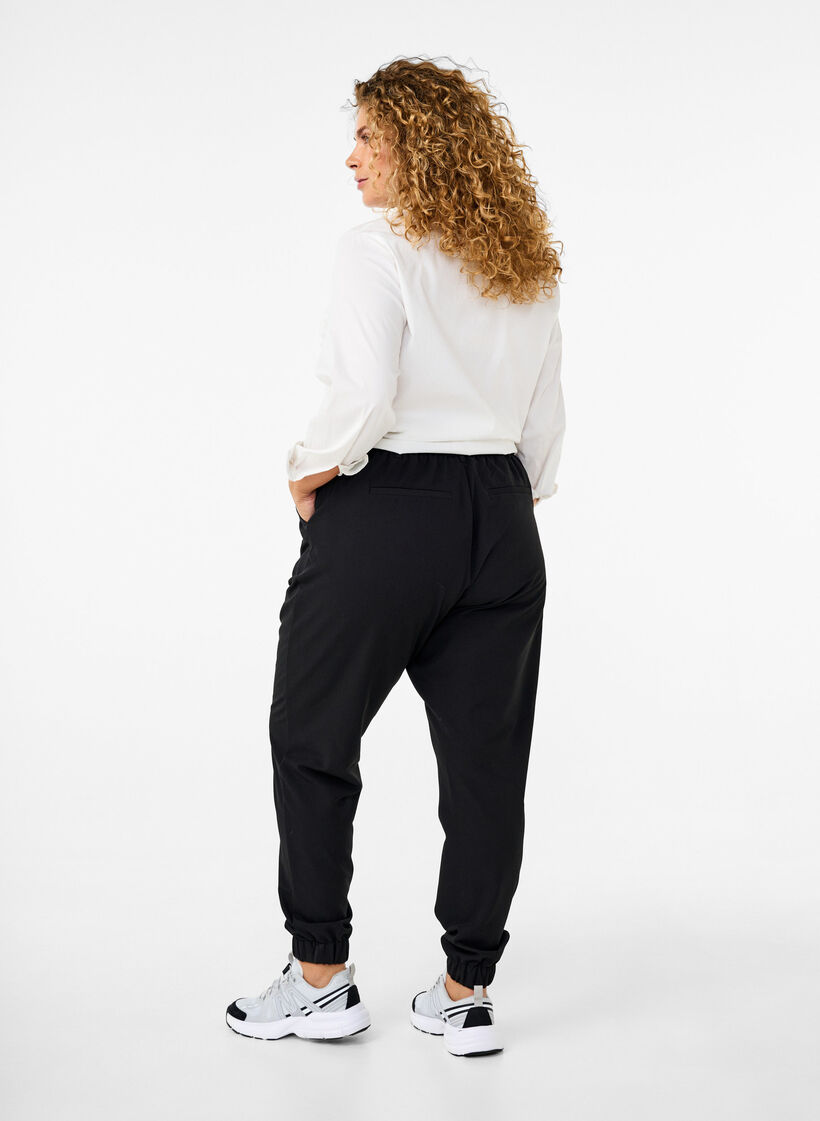 Pantalon avec taille et cheville élastiques, Black, Model image number 1