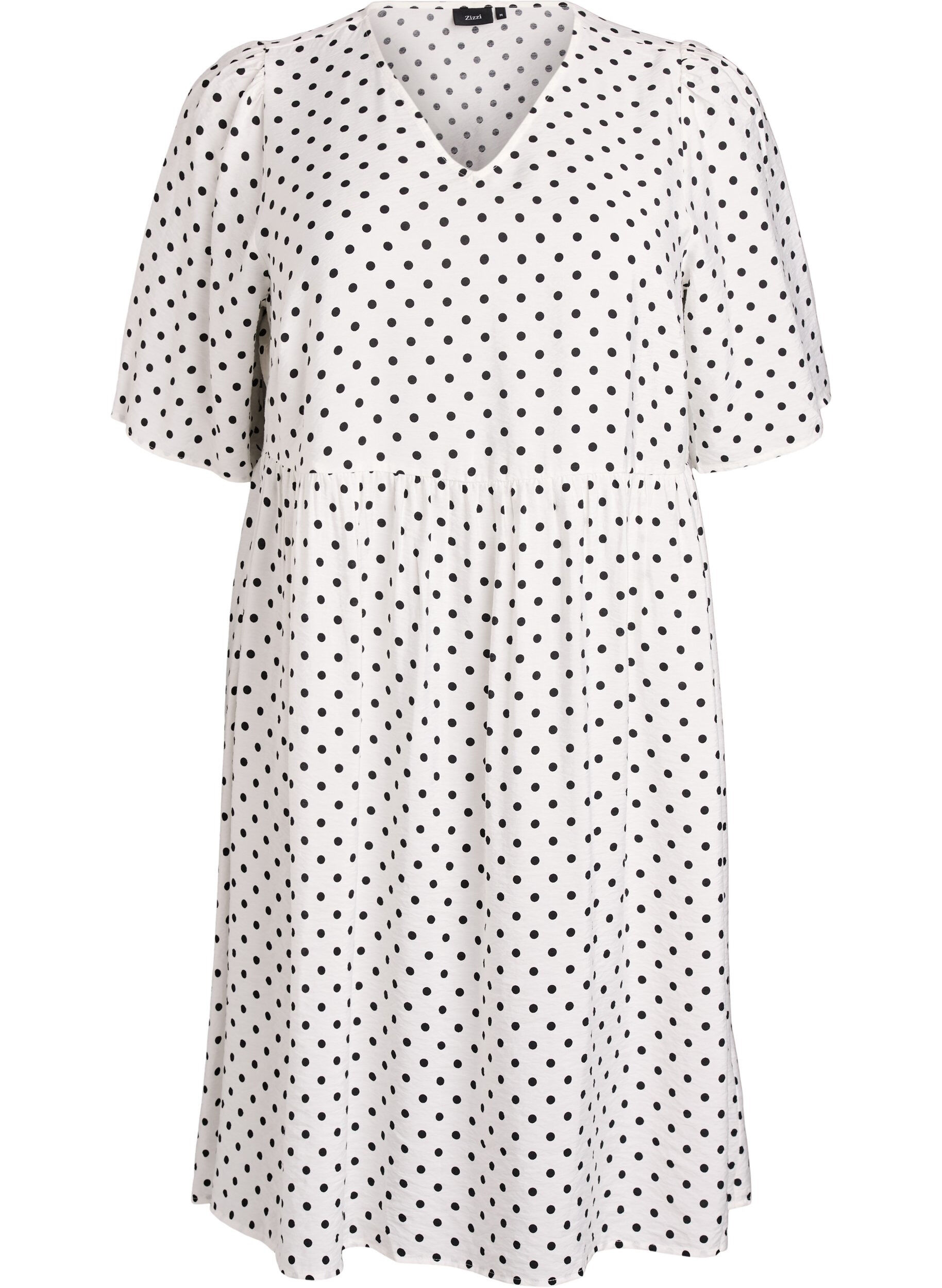Robe &agrave; pois avec d&eacute;collet&eacute; en V et coupe &eacute;vas&eacute;e