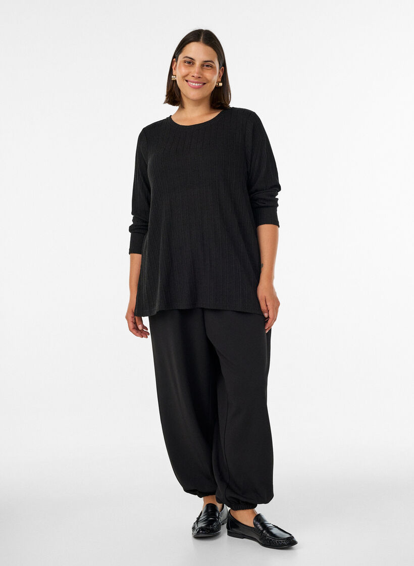 Blouse en jersey avec structure c&ocirc;tel&eacute;e et manches longues, Noir, Model image number 1