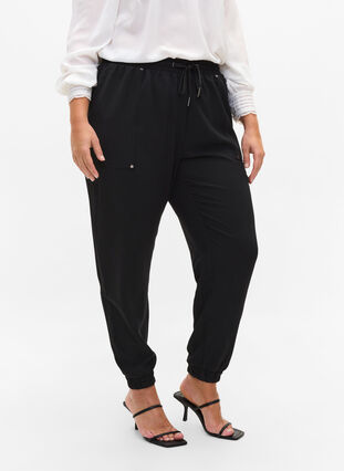 Pantalon avec poches et ourlet élastique, Black, Model image number 3