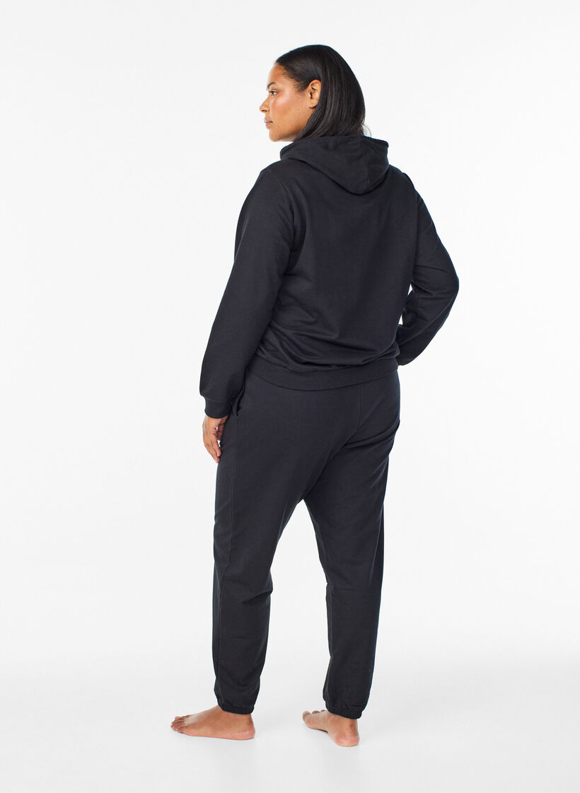 Pantalon de surv&ecirc;tement avec poches, Noir, Model image number 1