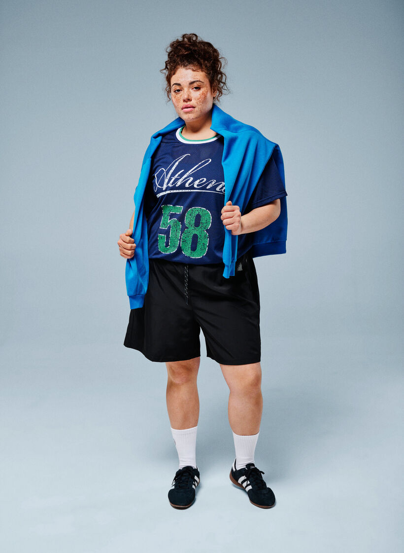 Short d&rsquo;entra&icirc;nement avec short int&eacute;rieur et poche t&eacute;l&eacute;phone, Noir, Image