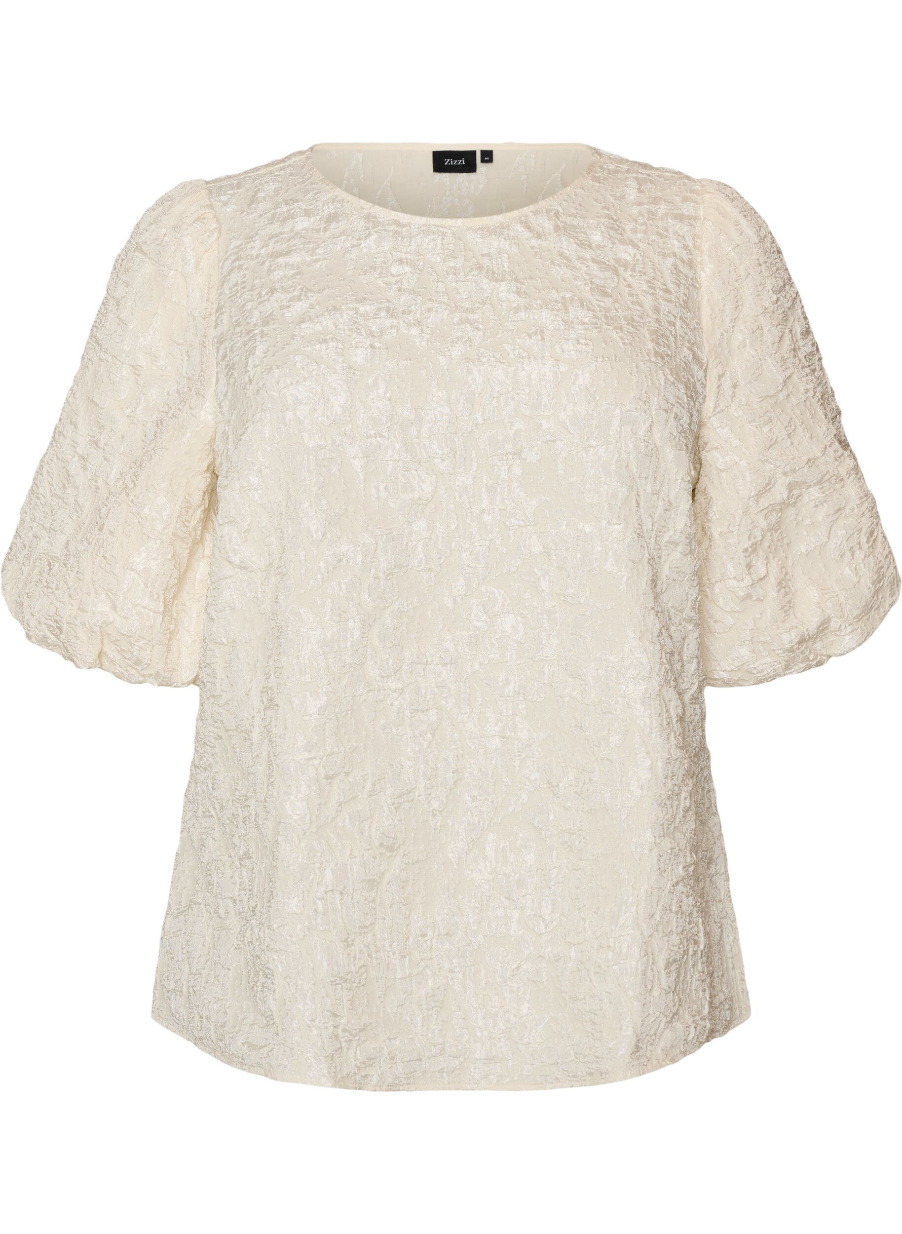 Blouse en jacquard avec des manches bouffantes et une coupe &eacute;vas&eacute;e