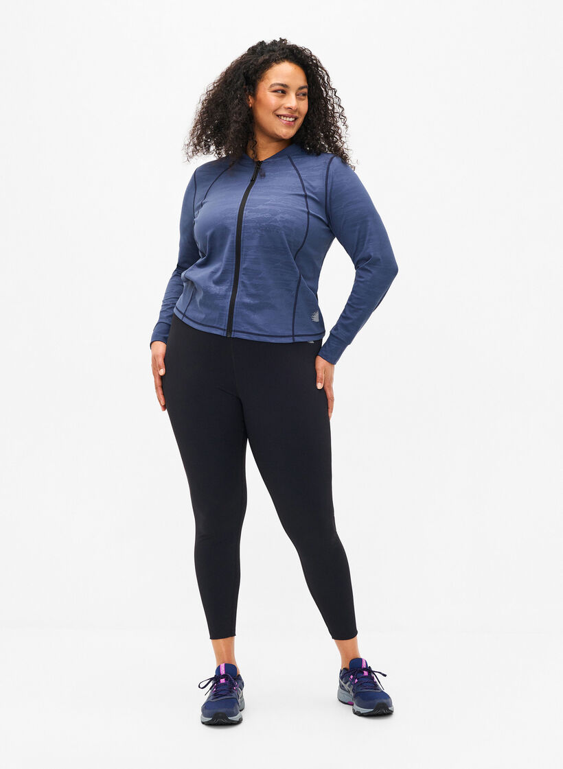 Leggins d'exercice court avec poche, Noir, Model image number 1