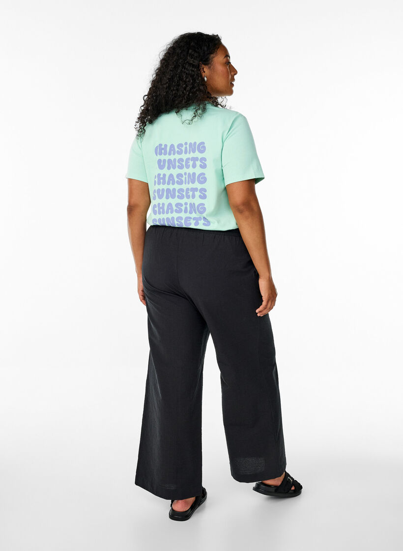 Pantalon ample avec taille haute et poches, Noir, Model image number 1