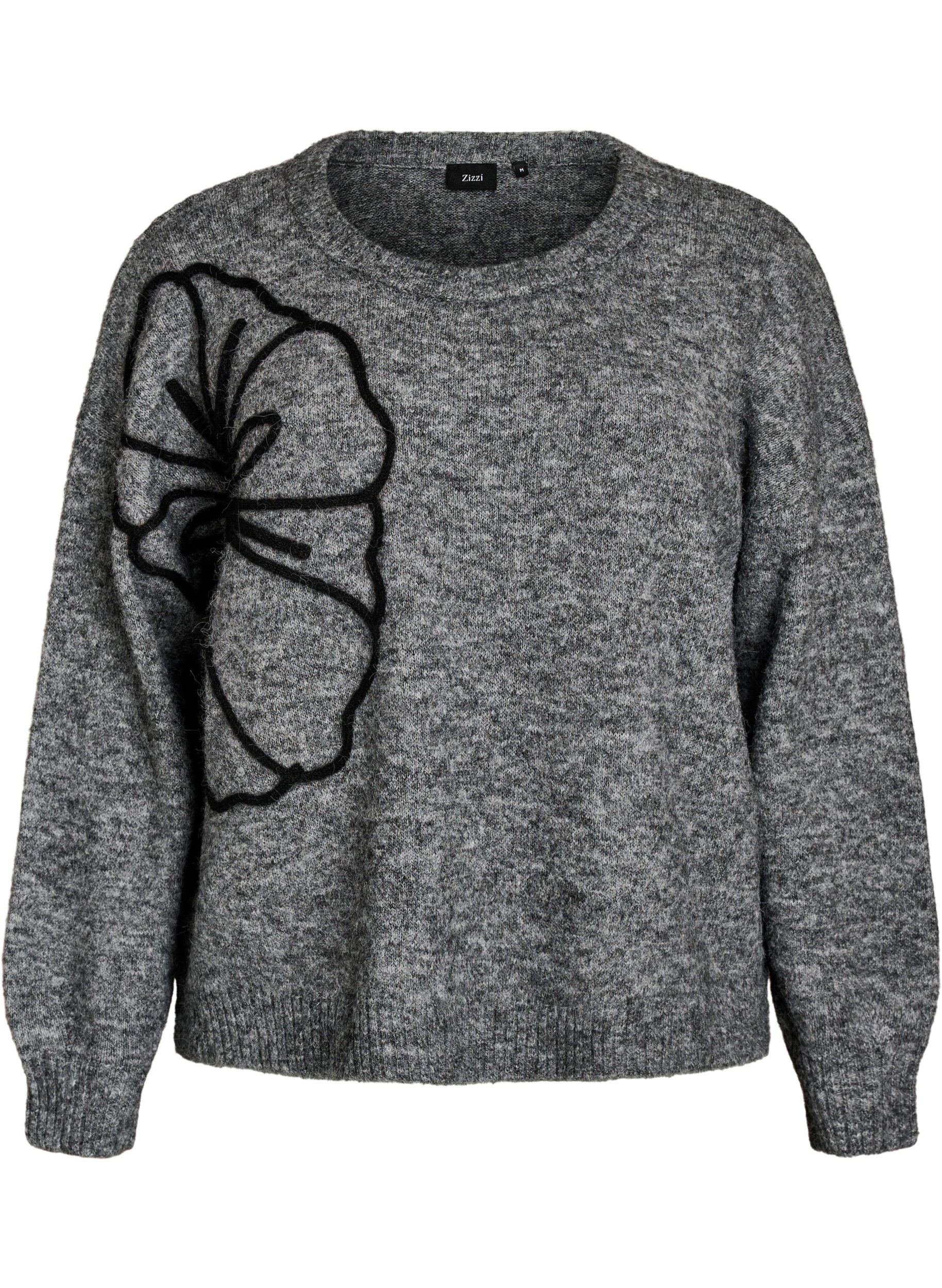Pull avec application florale