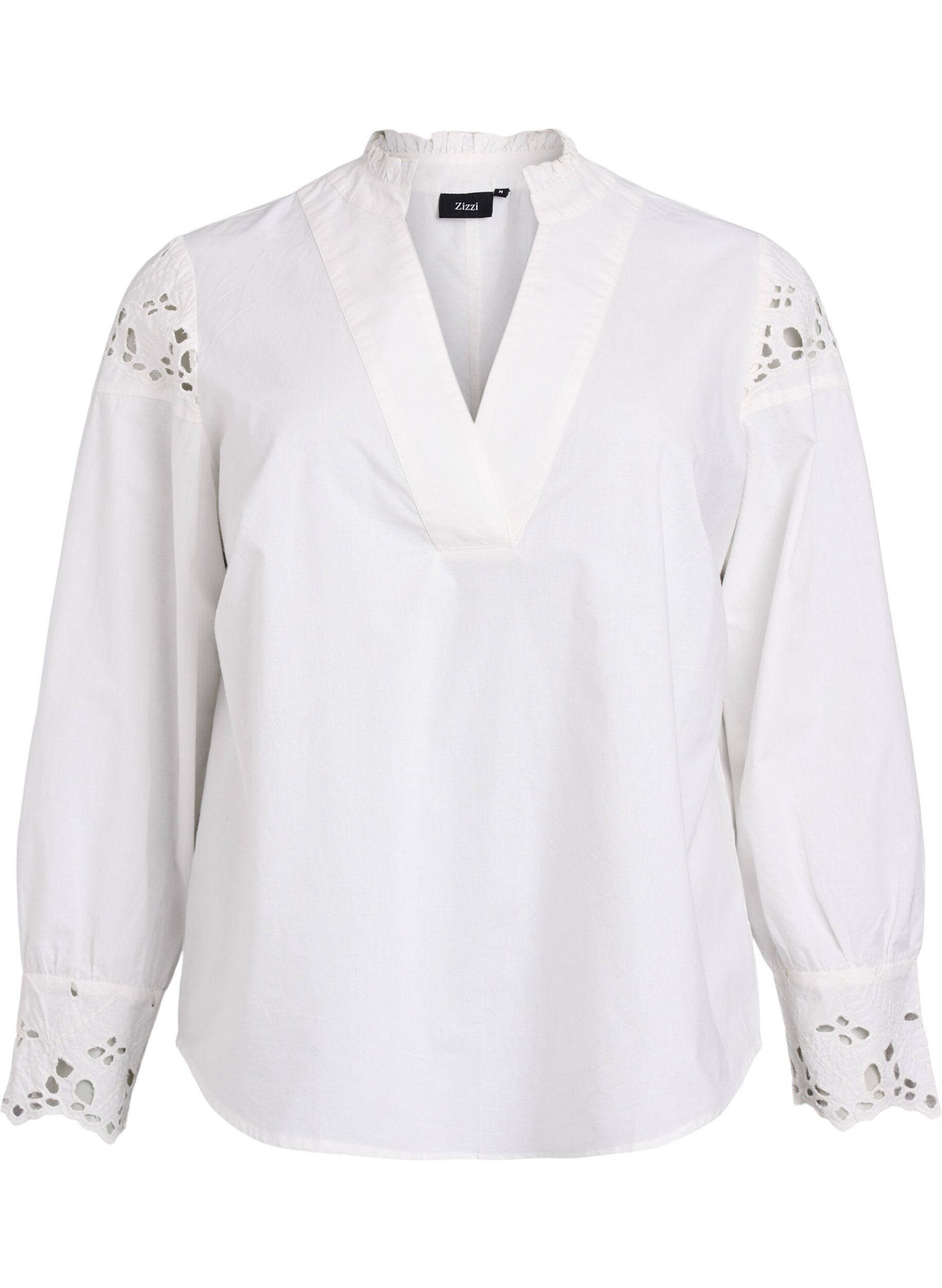 Blouse avec col en V et d&eacute;tails en broderie anglaise