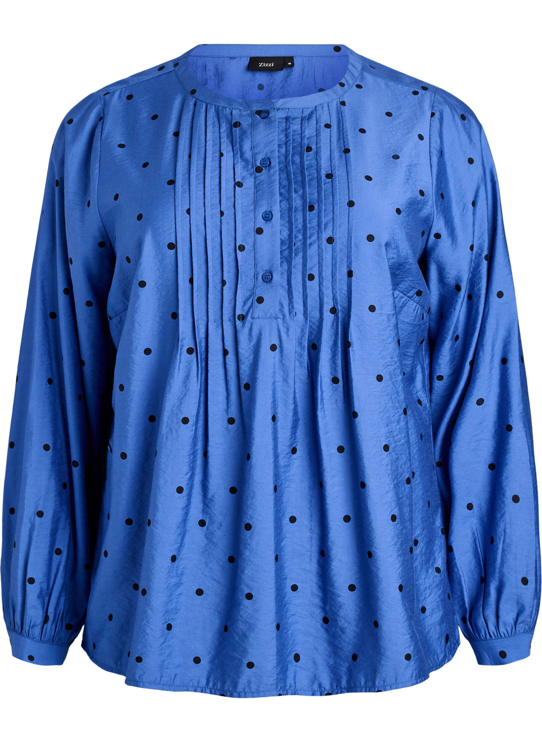 Blouse &agrave; pois avec manches longues