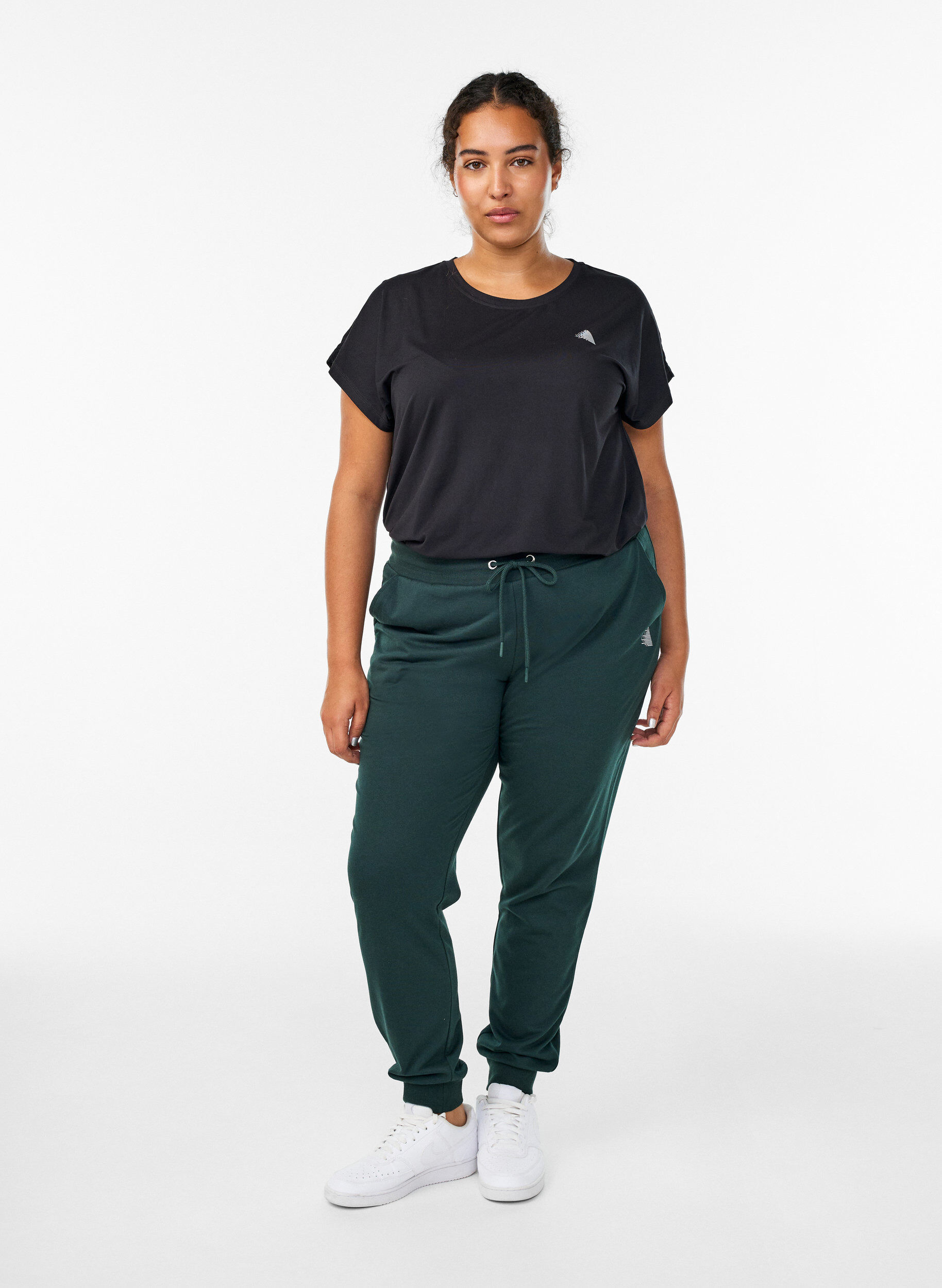 Pantalon de surv&ecirc;tement ample avec poches, Vert fonc&eacute;, Model