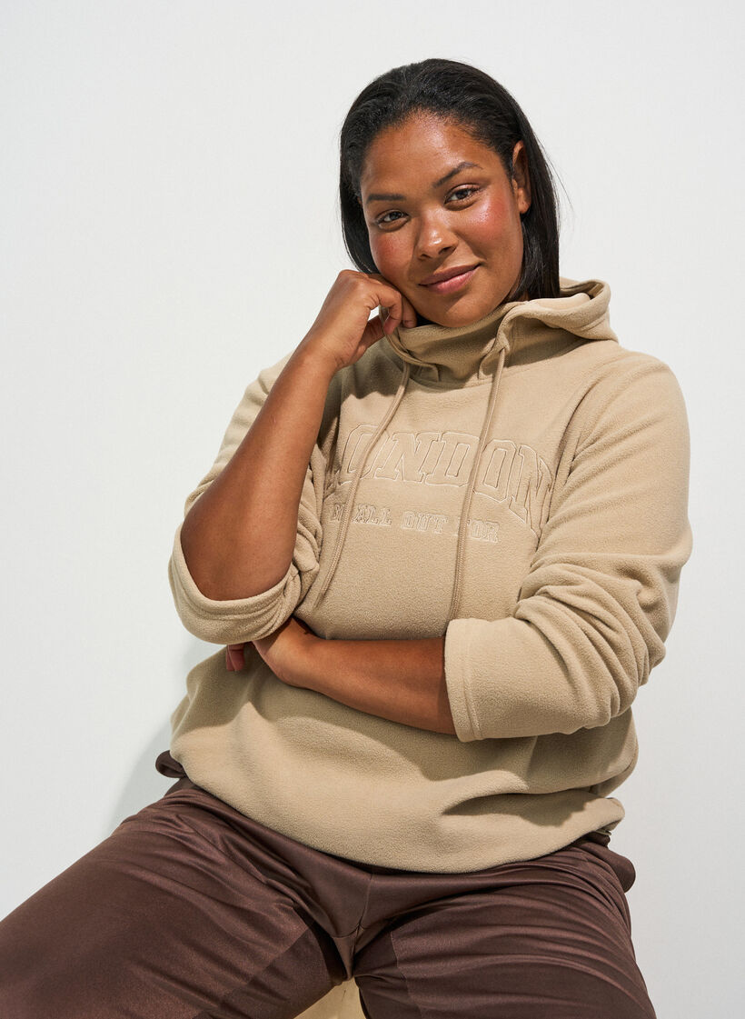 Sweat &agrave; capuche en polaire avec col montant et texte brod&eacute;, Beige, Model image number 0