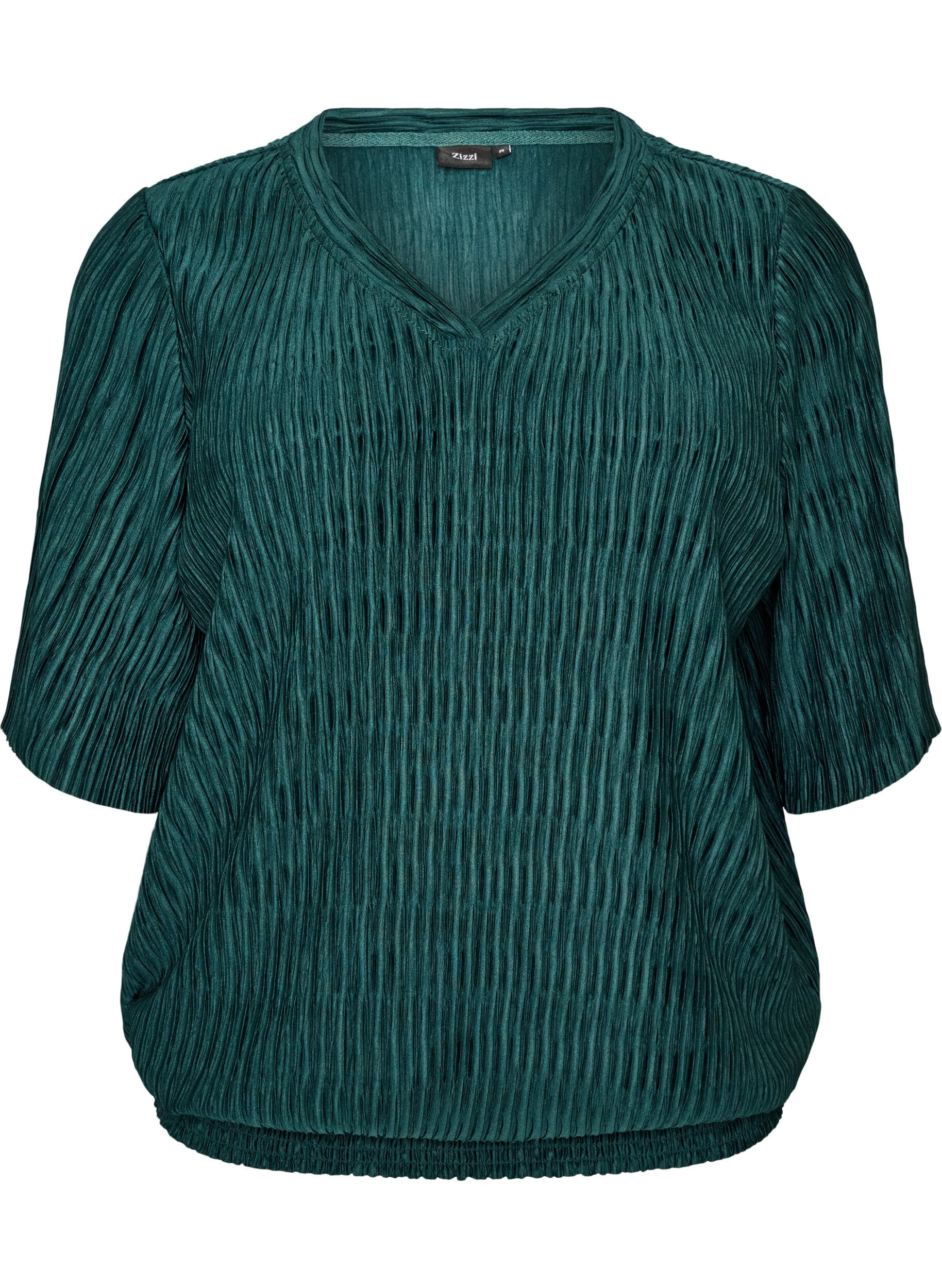 Blouse avec texture ondul&eacute;e et coupe ballon