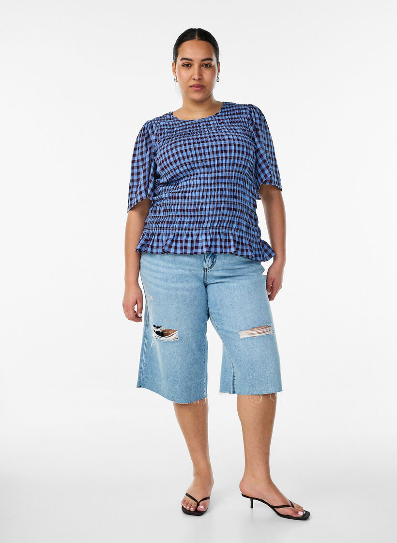 Jean cropped &agrave; effet us&eacute; et bords bruts, Bleu Clair, Model
