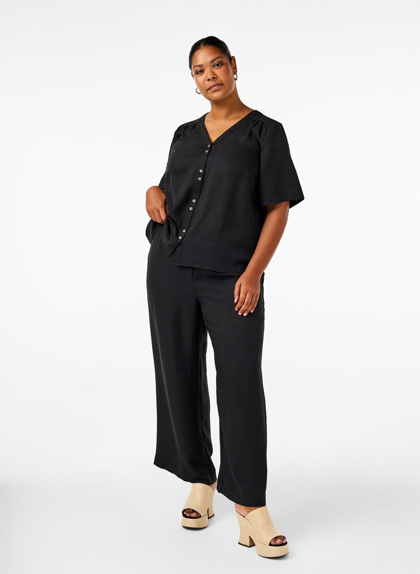 Pantalon ample avec ceinture &eacute;lastique et poches, Noir, Model image number 0