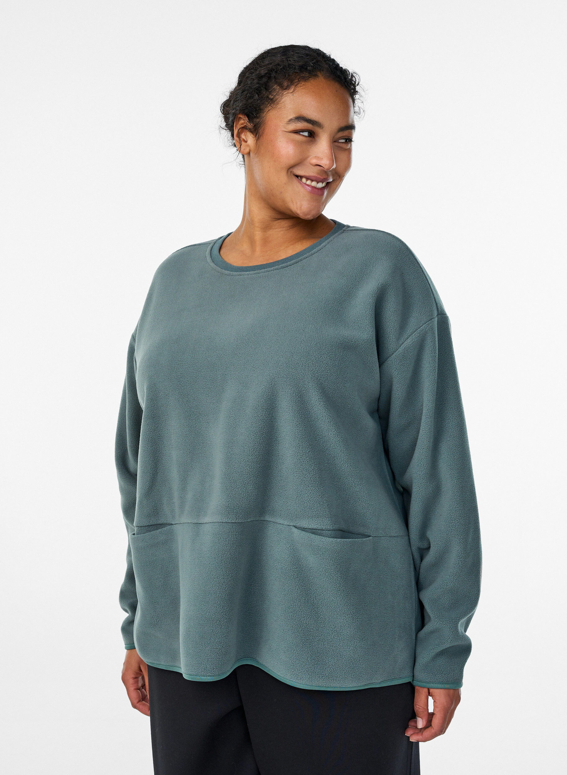 Zizzi Blouse ample en polaire avec poches, Vert fonc&eacute;, Model image number 0