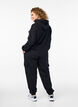 Pantalon cargo en matière douce et confortable, Black, Model image number 1